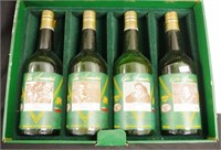 Cased four bottles Elliotts 'The Immortals' port