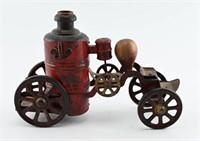 Early 19th century tin wind up fire pumper wagon