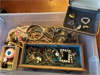 Clear tote of costume jewelry