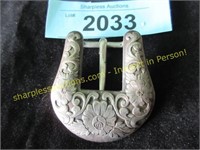 Fancy silver buckle with flowers