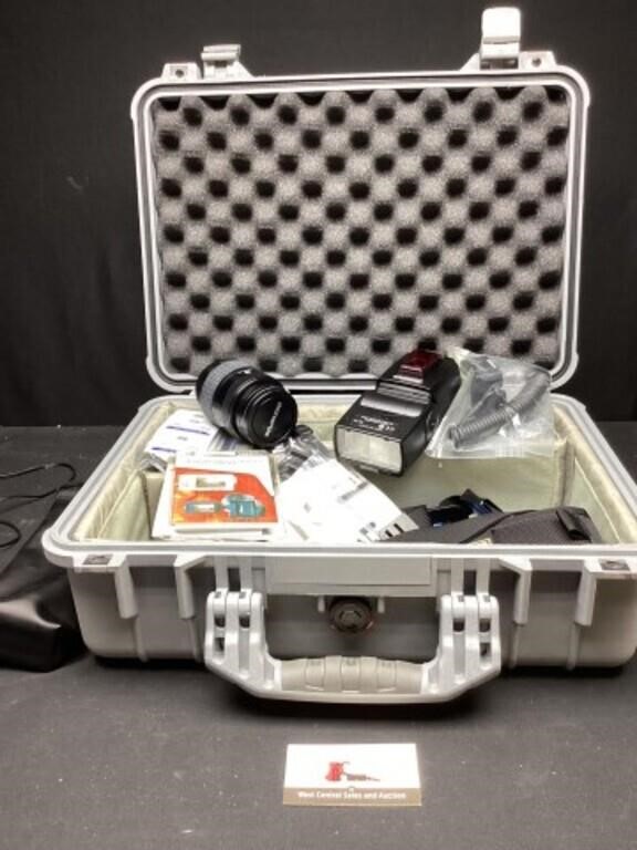 Case with camera equipment/ lenses.