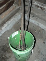 Plastic bucket with pump handle, hay hooks, auger