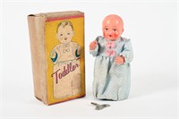 1950'S WIND-UP "TODDLER" TOY WITH BOX