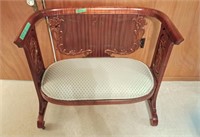 Elegant and stylish dark brown bench with carving