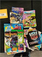 Assorted 1980s action figure inserts
