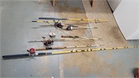 5 fishing poles and reels
