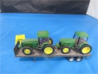 2 John Deere Tractors on Flatbed