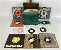 45 rpm records in case including Peggy Lee,