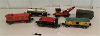 Box of miscellaneous old tin trains