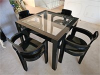 Black plastic table/glass top & 4 plastic chairs
