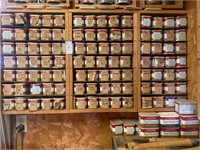 Wall of Organized Various Hardware in Canisters