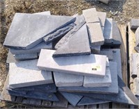 Grey paver bricks of various sizes