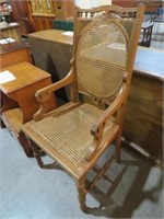 ANTIQUE CANE BACK AND BOTTOM ARMCHAIR