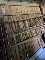 2 wooden ladders approximately 16’ long