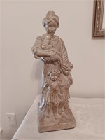 Heavy statue possibly chalkware 18 inches tall.