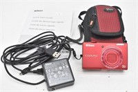Nikon Coolpix Camera w/ Case, Book & Charging Cord