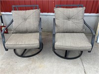 2 metal swivel patio chairs w/ cushions