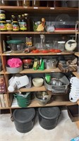 Six shelf lot that includes fondue pot, cutting