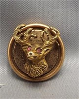 10K Yellow gold Elks pin with ruby eyes.