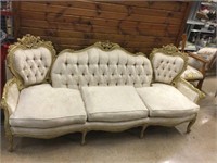 French provincial 3 cushion tufted back couch.