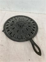 Cast iron ten inch lid.