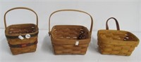 (3) Longaberger baskets dated 1988, 1989, 1993.