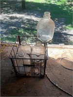 Vintage metal basket and 4 glass jugs