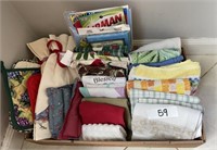Flat of kitchen towels and potholders