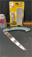 Sharpening Stone And Folding Saw