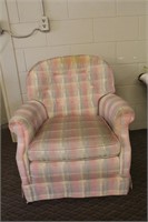 Upholstered armchair, button tufted back, on
