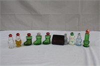 Assortment of Avon Christmas perfume bottles