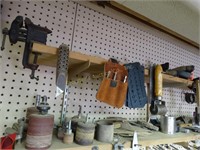 Contents of 2 shelves: small vise 2", clamps, etc