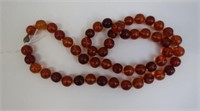 Amber bead necklace with silver clasp
