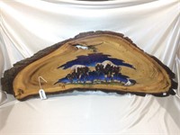Buffalo carving/painting in unique tree slab
