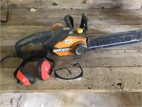 Worx electric chainsaw. Runs. Goggles too