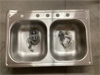 Double stainless steel sink damaged on corner s