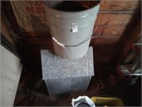 Galvanized storage bin, and steel bucket.
