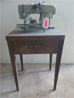 Sears Kenmore sewing machine with foot pedal on