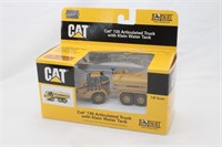CAT 730 ARTICULATED TRUCK W/KLEIN WATER TANK- NORS