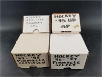 4 Boxes of hockey cards including Pinnacle Select
