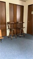 Two bar stools with backs and swivel