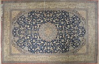 A FINELY KNOTTED PERSIAN TABRIZ RUG