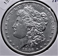 1886 S MORGAN DOLLAR AU