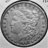 1887 S MORGAN DOLLAR AU