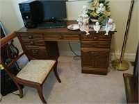 Old wooden desk with chair