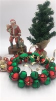 Bell Christmas wreath, musical Santa figurine