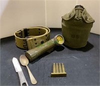 US Army light, belt, canteen, flashlight, clip of