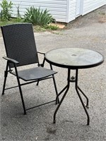 Small outdoor metal table with glass top 24