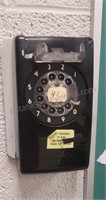 Vintage rotary wall phone.  No hand piece. Buyer