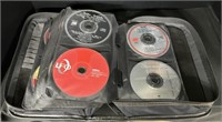 Binder of DVD Movies & CDs.
